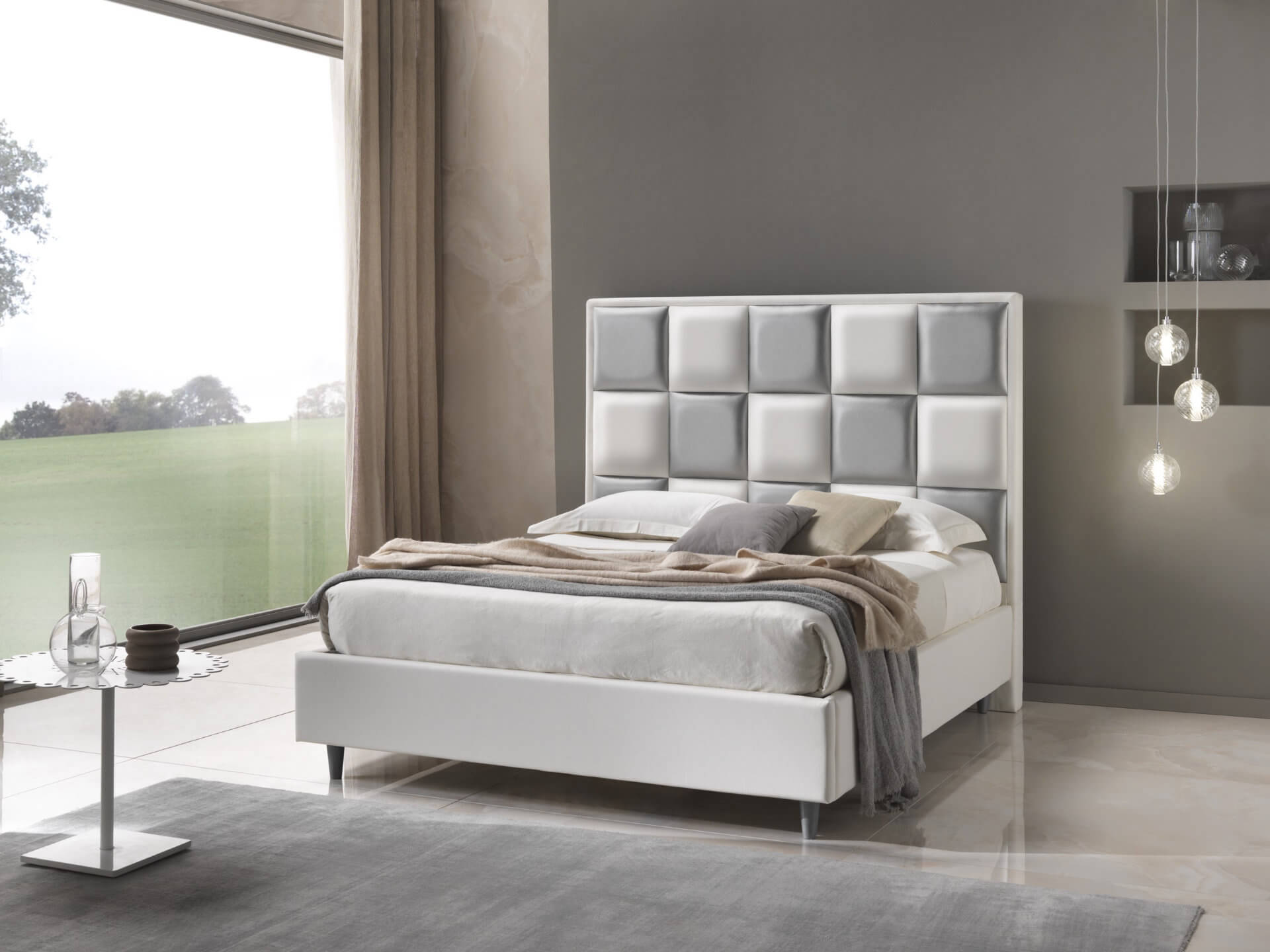 letto matrimoniale contenitore con testata in pelle