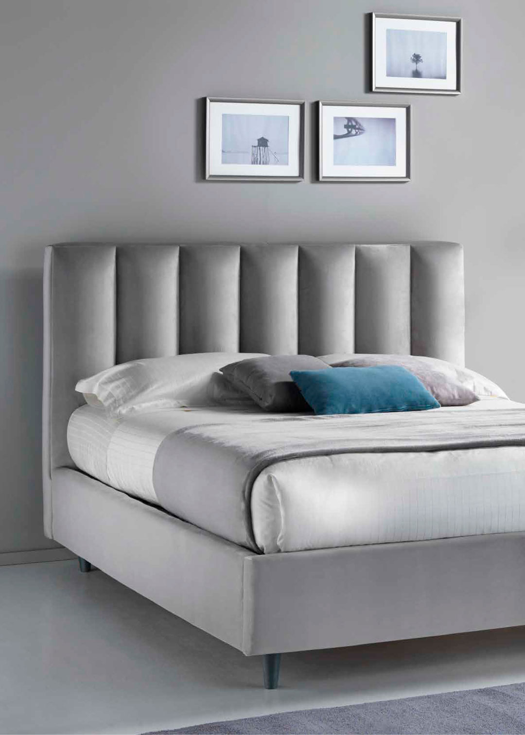 Letto matrimoniale con testata morbida