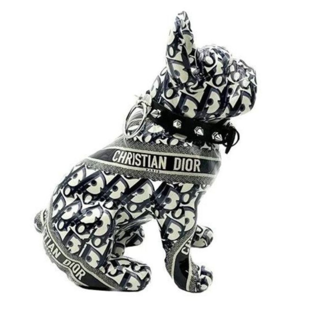 lato statuetta in resina dior